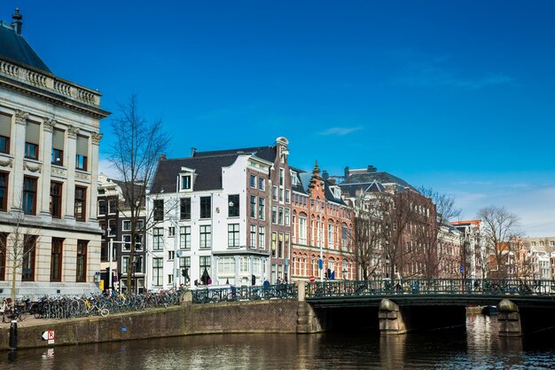 Explore the Canals and Stunning Architecture of Amsterdam’s Old Central District – Free Download