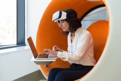 Businesswoman Engaging with VR Technology – Free to Download