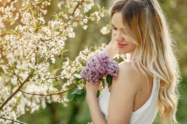 Elegant and Stylish Girl in a Spring Park – Free Stock Photo for Download