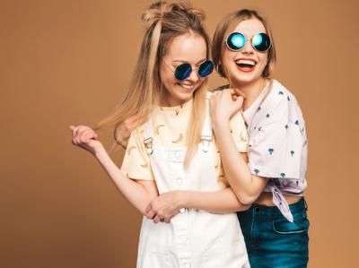 Two Young Beautiful Smiling Blond Hipster Girls in Trendy Summer Colorful T-Shirt Clothes – Free Download