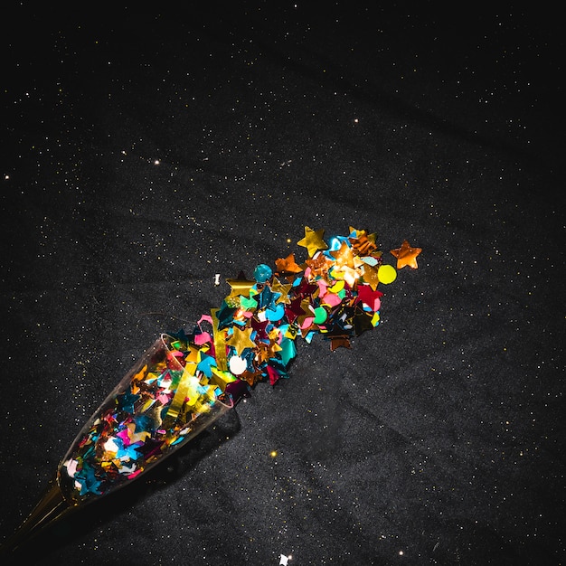 Confetti-Filled Glass on Floor – Free Download