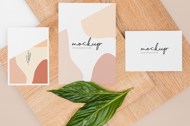 Flat Lay Stationery with Leaves and Wooden Piece – Free Stock Photo for Download