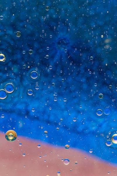 Colorful Water Surface with Oil Droplets – Free Download