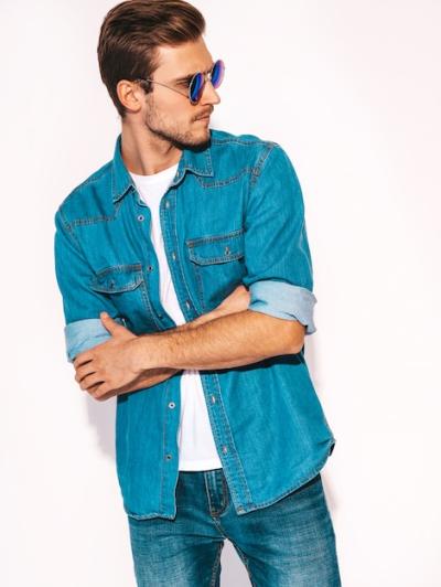 Handsome Young Man in Stylish Jeans and Sunglasses – Free Stock Photo for Download