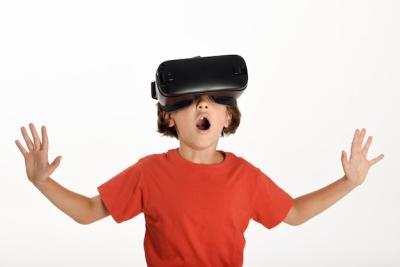 Little Girl Enjoying Virtual Reality Experience – Free Download