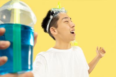 Korean Young Man’s Half-Length Portrait on Yellow Wall – Free Download
