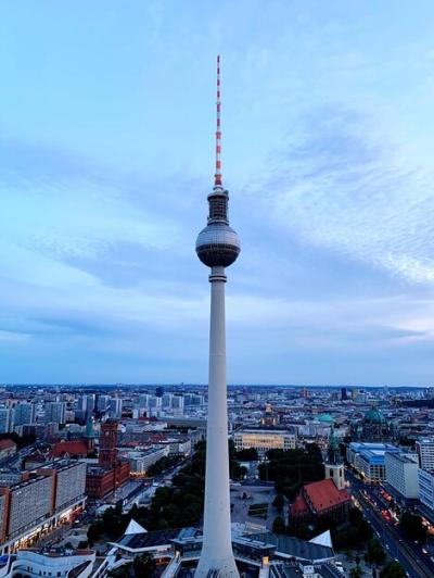 Communications Tower in City Against Sky – Free Download