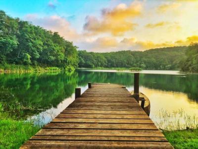 Stunning Wooden Pier Over Lake Against a Beautiful Sky – Free Download