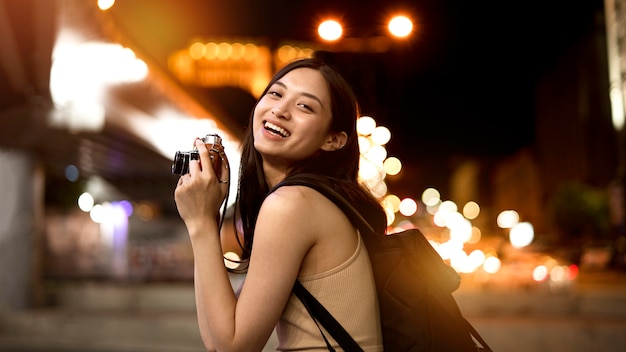 Beautiful Female Photographer in the City at Night – Free Stock Photo, Download Free Stock Photo