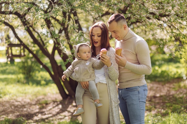 Family Enjoying a Walk in the Park – Free Download