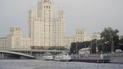Stalinist Style Skyscraper on the Moscow River with Touristic Ships – Free Download