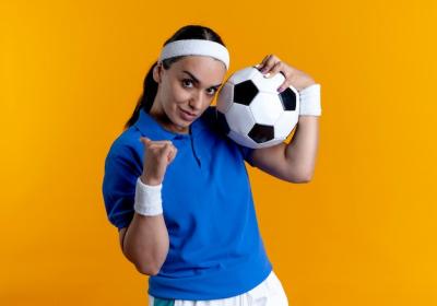 Confident Caucasian Sporty Woman Holding a Ball â Free to Download