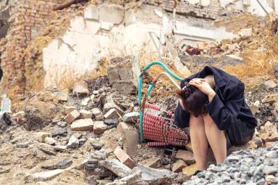 A Girl Next to a House Destroyed by War in Ukraine – Free Download