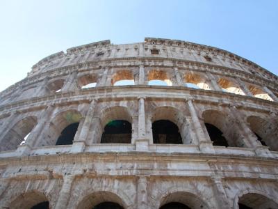 Colosseum in Rome Surrounded by a Beautiful Blue Sky – Free to Download