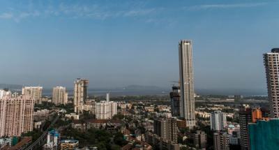 Modern City Buildings Against a Clear Sky – Free Stock Photo for Download