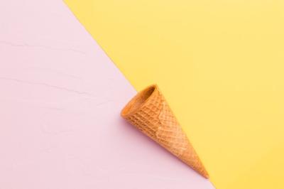 Smooth Empty Ice Cream Cone on Multicolored Surface – Free Stock Photo, Download for Free