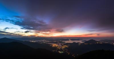 Stunning City Lights and Mountains at Sunset – Free Download