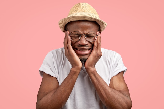 Depressed Unhappy Man with Dark Skin – Free Stock Photo for Download