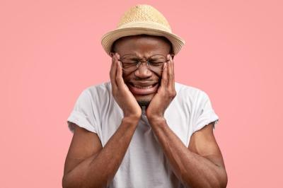 Depressed Unhappy Man with Dark Skin – Free Stock Photo for Download