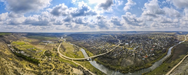 Aerial Drone Panorama View of a Village in Moldova Near a River and Hills – Free Download