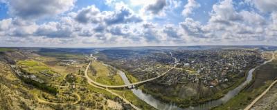 Aerial Drone Panorama View of a Village in Moldova Near a River and Hills – Free Download