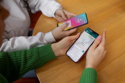 High Angle Friends Holding Smartphones – Free to Download Quality Stock Photo
