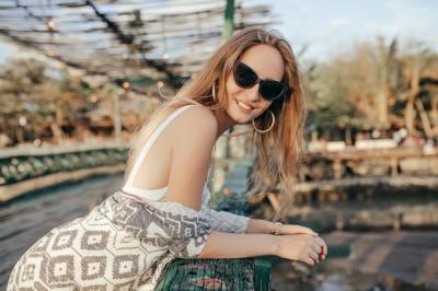 Charming Young Woman Smiling in Nature – Free Stock Photo for Download