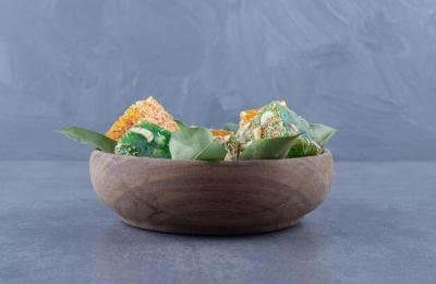 Turkish Delight Bowl with Hazelnuts on Grey Background – Free Download