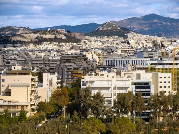 Top View of Athens’ Urban Architecture: House, Acropolis, and Likavitos Hill – Free Stock Photo, Download for Free