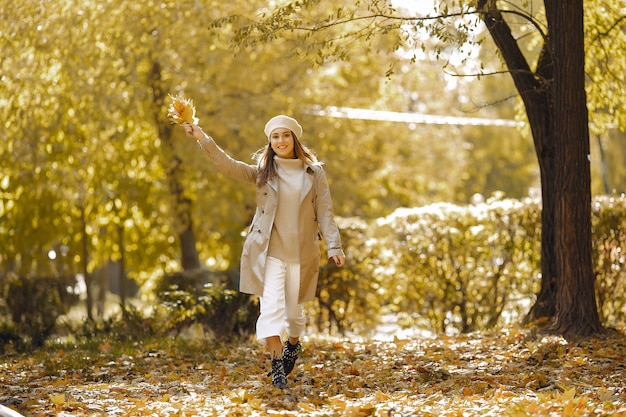 Elegant and Stylish Girl in an Autumn Park – Free Download