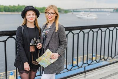 Women Tourists at Waterfront – Free Stock Photo for Download