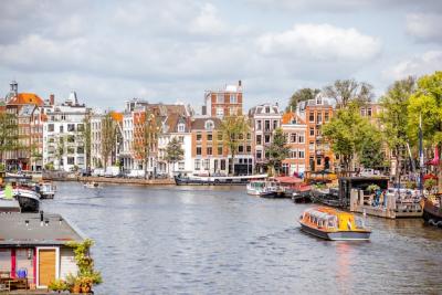 Beautiful Old Buildings and Water Channels in Amsterdam City – Free Stock Photo, Download Free