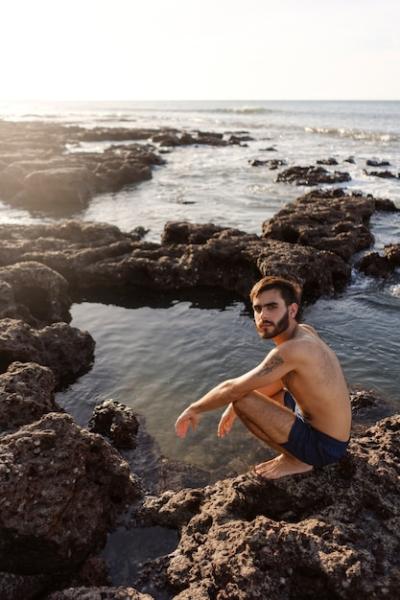 Man with Hairy Chest at Seaside – Free Download