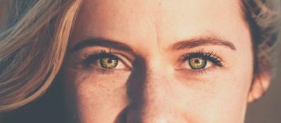 Beautiful Female Face with Green Eyes – Free Stock Photo for Download