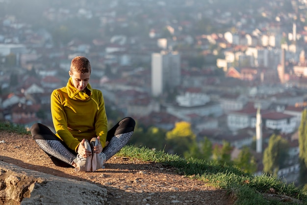Outdoor Full Shot of Woman Stretching – Free Download