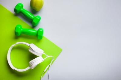 Flat Lay Frame Featuring Headphones and Dumbbells – Free Stock Photo, Download for Free