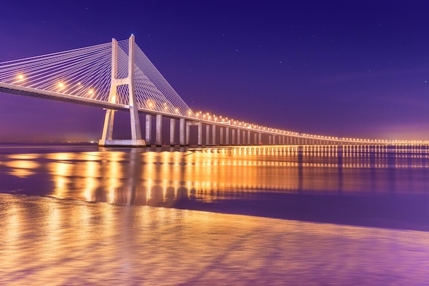 Modern Cable-Stayed Bridge at Night in Lisbon, Portugal – Free Download