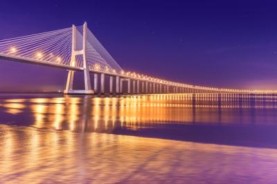 Modern Cable-Stayed Bridge at Night in Lisbon, Portugal – Free Download