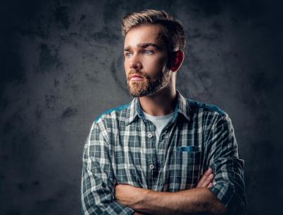 Studio Portrait of a Blue-Eyed Bearded Hipster Male Over Grey Background – Free Stock Photo, Download for Free