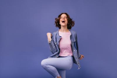 Active Pretty Girl Jumping with a Smile – Free Stock Photo for Download