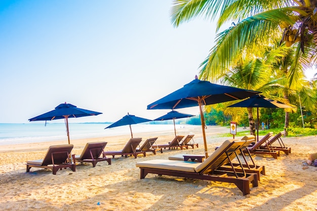 Turquoise Parasol on Sandy Beach – Free Download