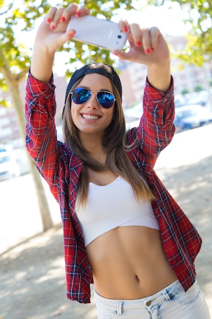 Female in Crop Top Taking a Selfie – Free Download