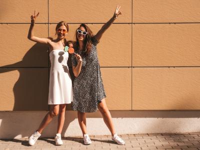 Two Young Beautiful Smiling Hipster Girls in Trendy Summer Dresses – Free to Download