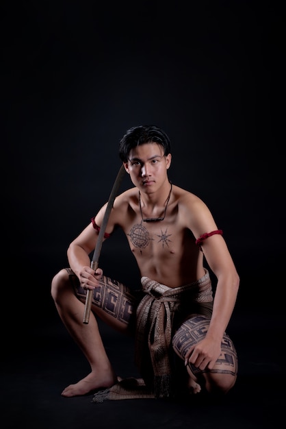 Young Thailand Male Warrior Posing with Sword – Free Download, Free Stock Photo