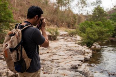 Hiker Capturing Stunning River Views – Free Stock Photo, Download for Free