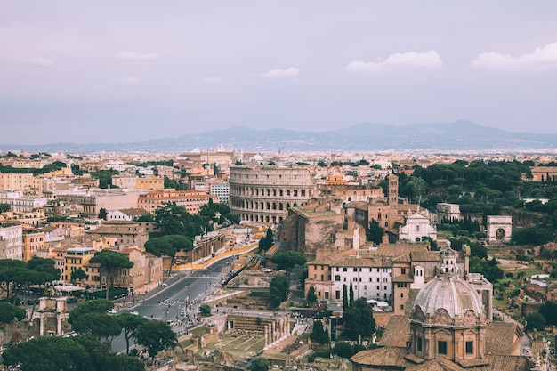 Discover the Panoramic View of Rome with the Roman Forum and Colosseum – Free to Download