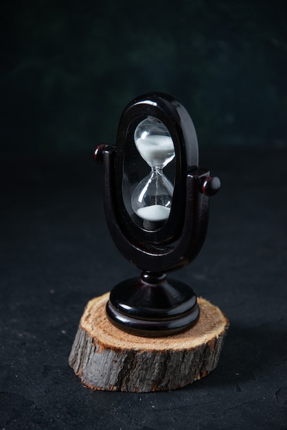 Black Hourglass On Dark Surface – Free Download