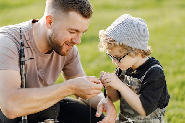 Quality Time Outdoors: Father and Curly Toddler Boy in Khaki Overall – Free Stock Photo for Download