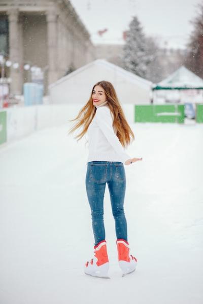 Cute and Beautiful Girl in a White Sweater in a Winter City – Free to Download