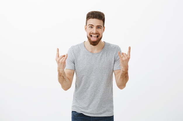 Carefree Caucasian Male Exuding Positive Vibes at Party – Free Stock Photo